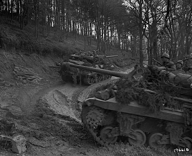 TANKS ON A FOREST TRAIL