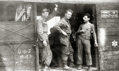 ARNOLD ERBSTOESSER STANDING I A BOXCAR